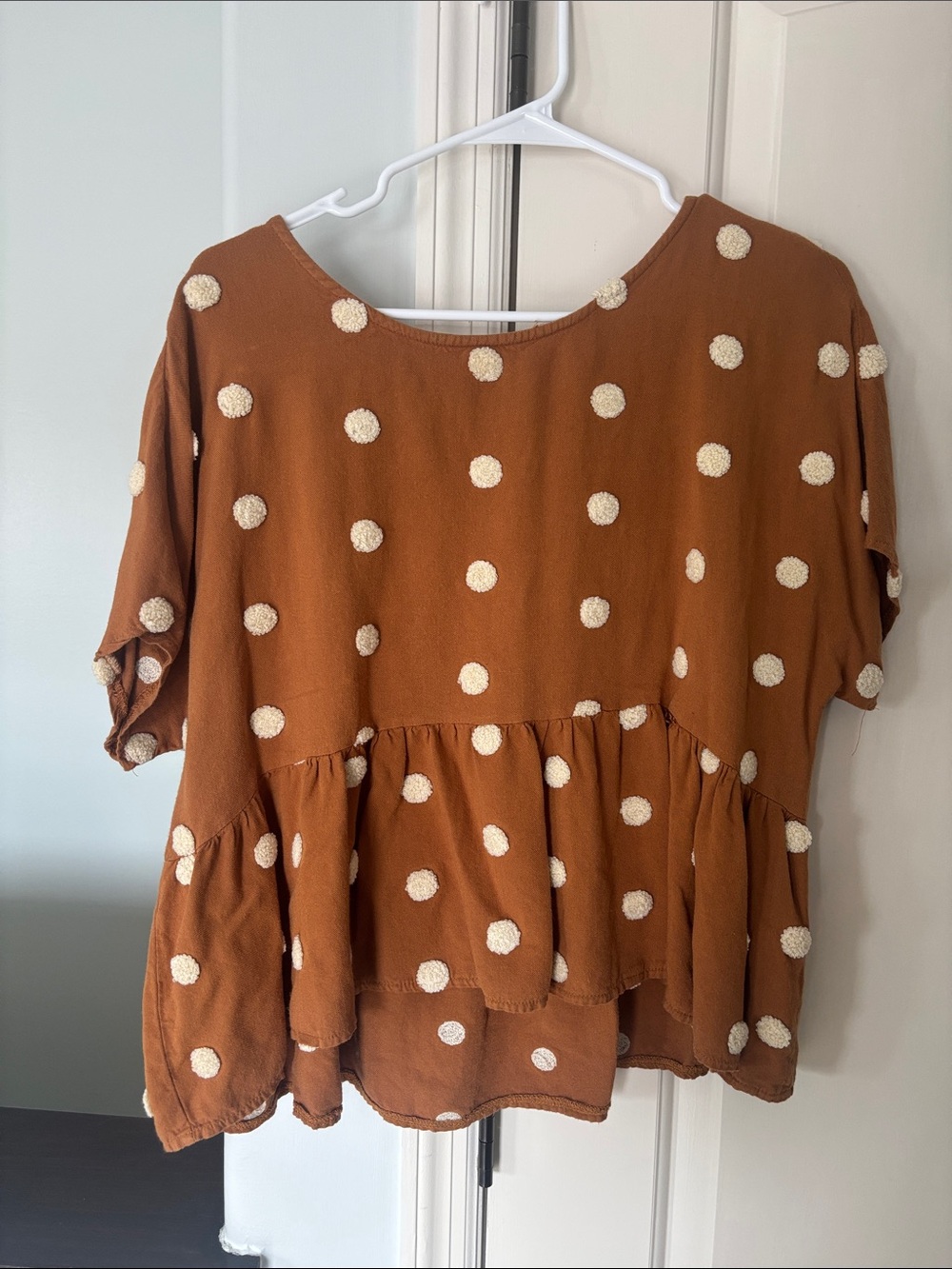 Boutique Polka Dot Peplum Top